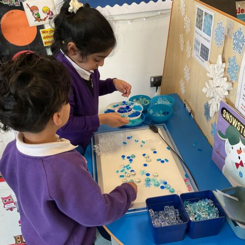 Creating ice pictures using the light table.