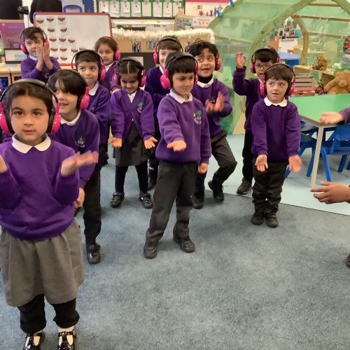 Spring 1- We had fun listening to a story using our headphones! #Now Press Play