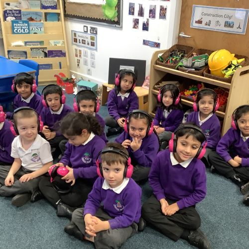 We listened to a Winter story using headphones - Now, Press, Play