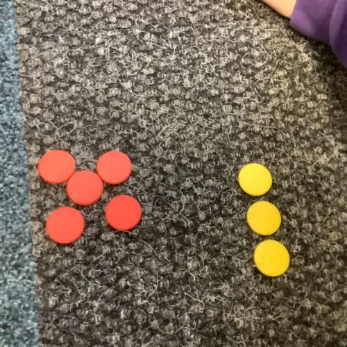 Magic Maths - more, fewer and equal.  Playing dice games.