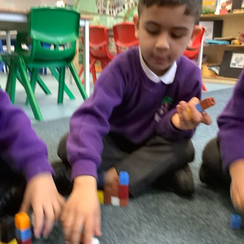 Magic Maths - adding one more and creating the tallest tower.