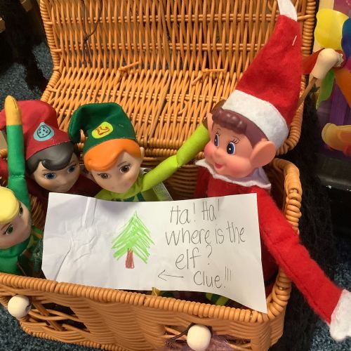 Finding our elf and candy canes in the woodland area!